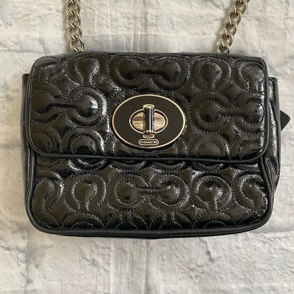 Coach mini shoulder/crossbody bag w/twist latch closure w/satin inner lining